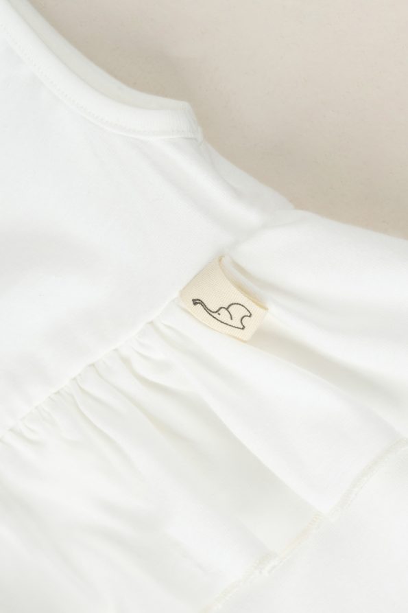 Ruffled Front Romper in Ecru