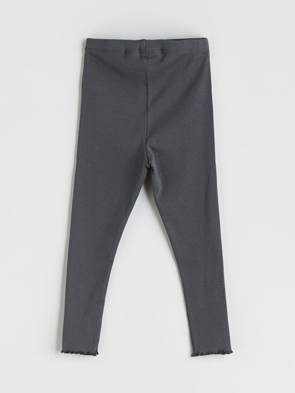 Girls' two-piece set: a Mickey Mouse blouse and leggings.