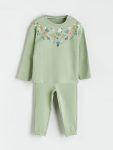 Light green blouse and pants