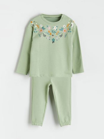 Light green blouse and pants