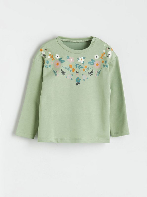 Light green blouse and pants
