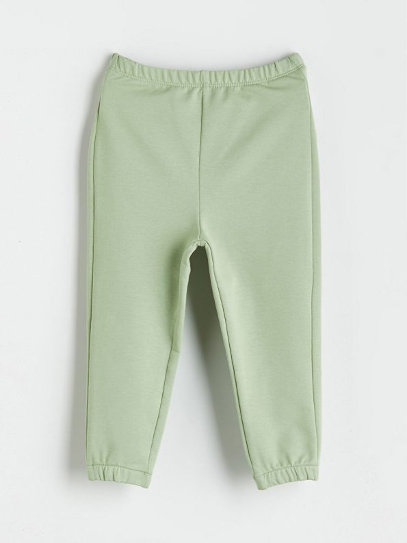 Light green blouse and pants