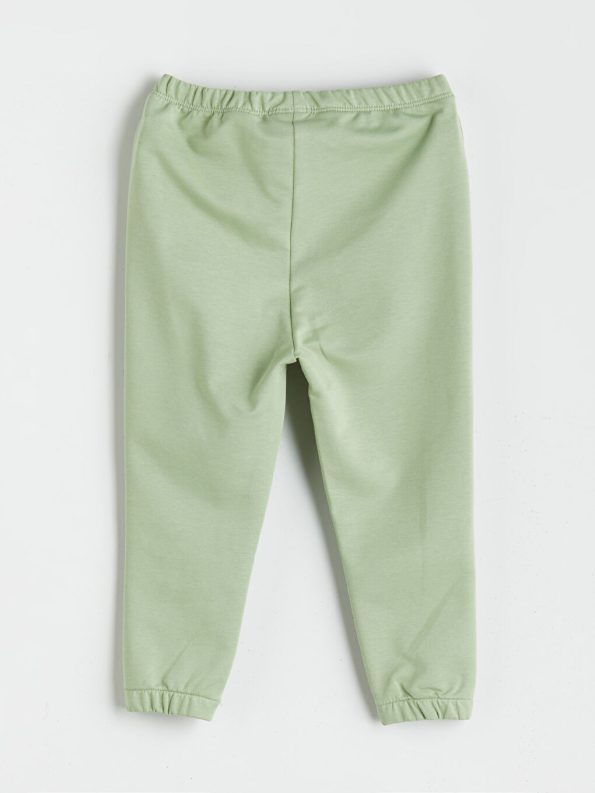 Light green blouse and pants