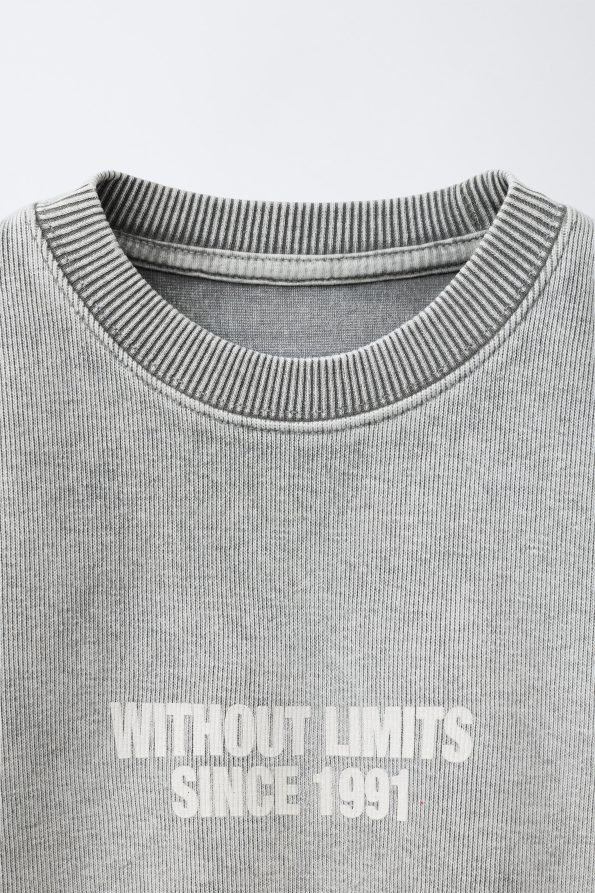 Faded Effect Slogan Sweatshirt