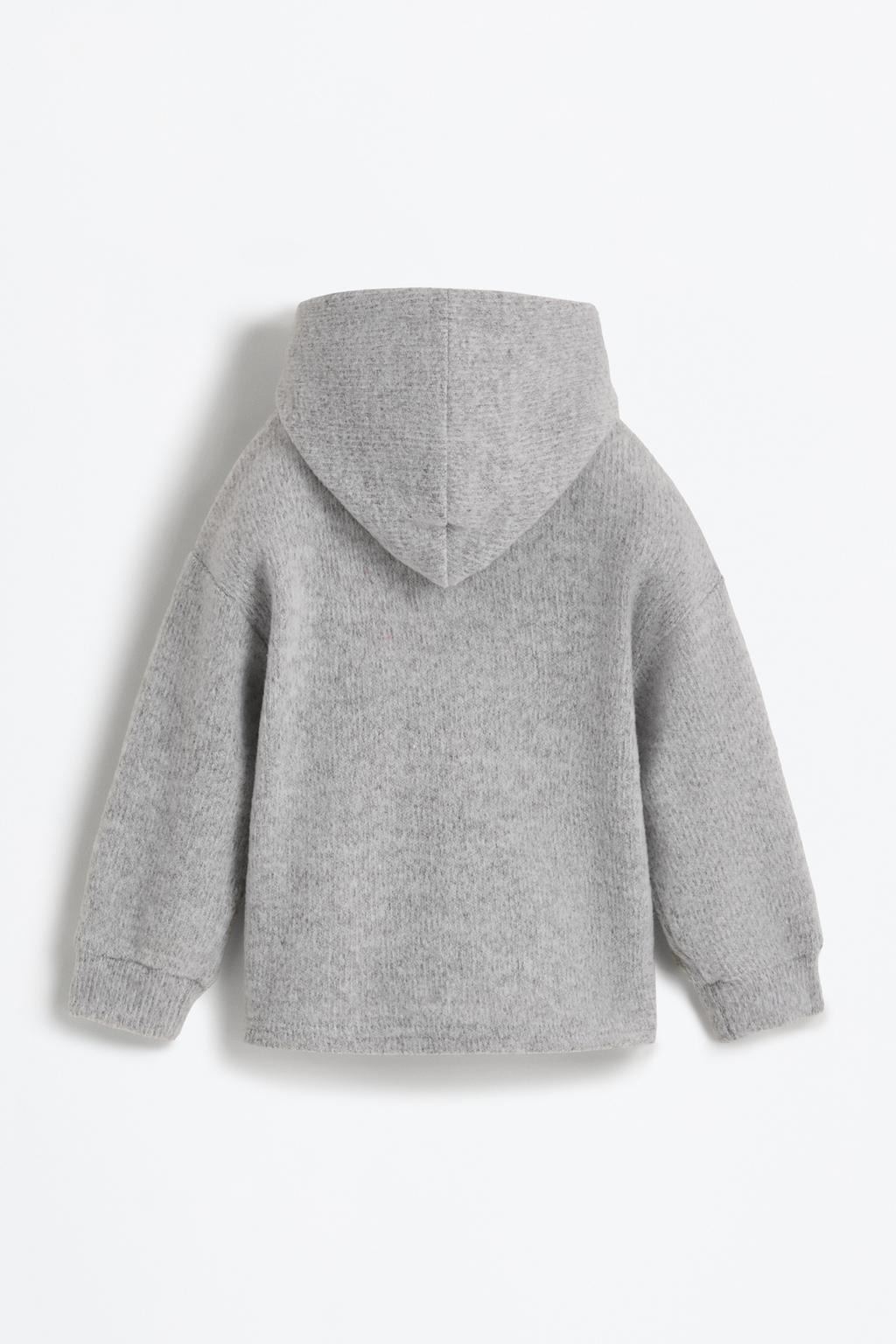 05054806812-A6-1.jpg Detailed Cut Hooded Sweatshirt