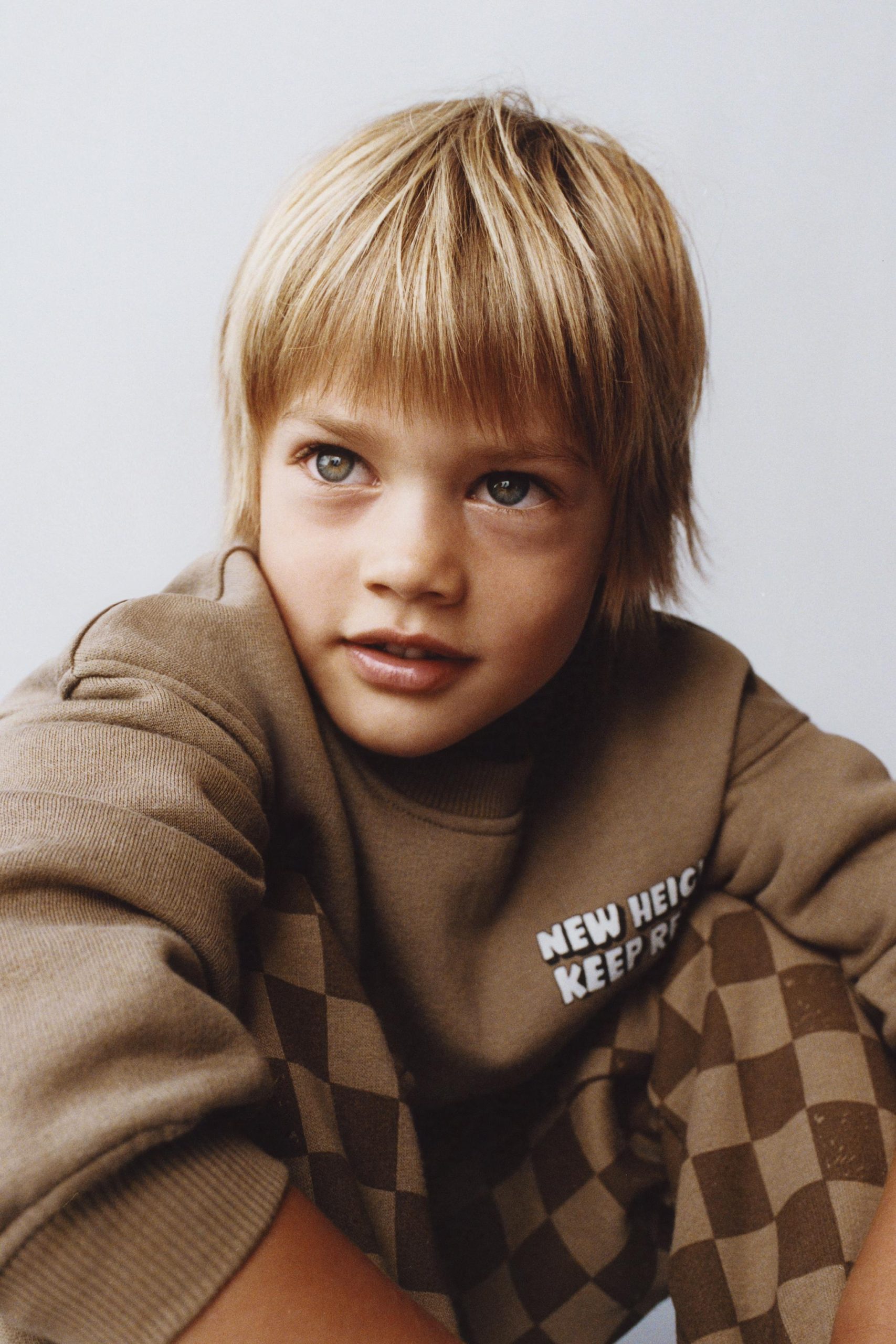 93499a2c-9abf-40ab-b848-9f95777ddfe5-e40b11.jpg Boys' Brown Cotton Checkered Tracksuit with New Heights Detail