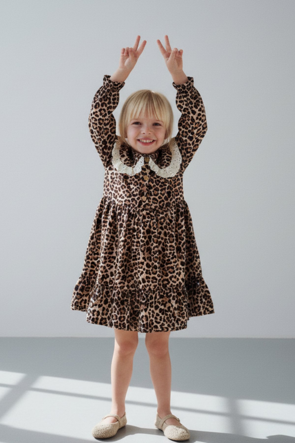 9a2cb128-5796-4406-845a-543a87ab721b-3af2cd.jpg Girls' Cotton Leopard Print Dress with Lace Collar - Stylish Ruffle Detail