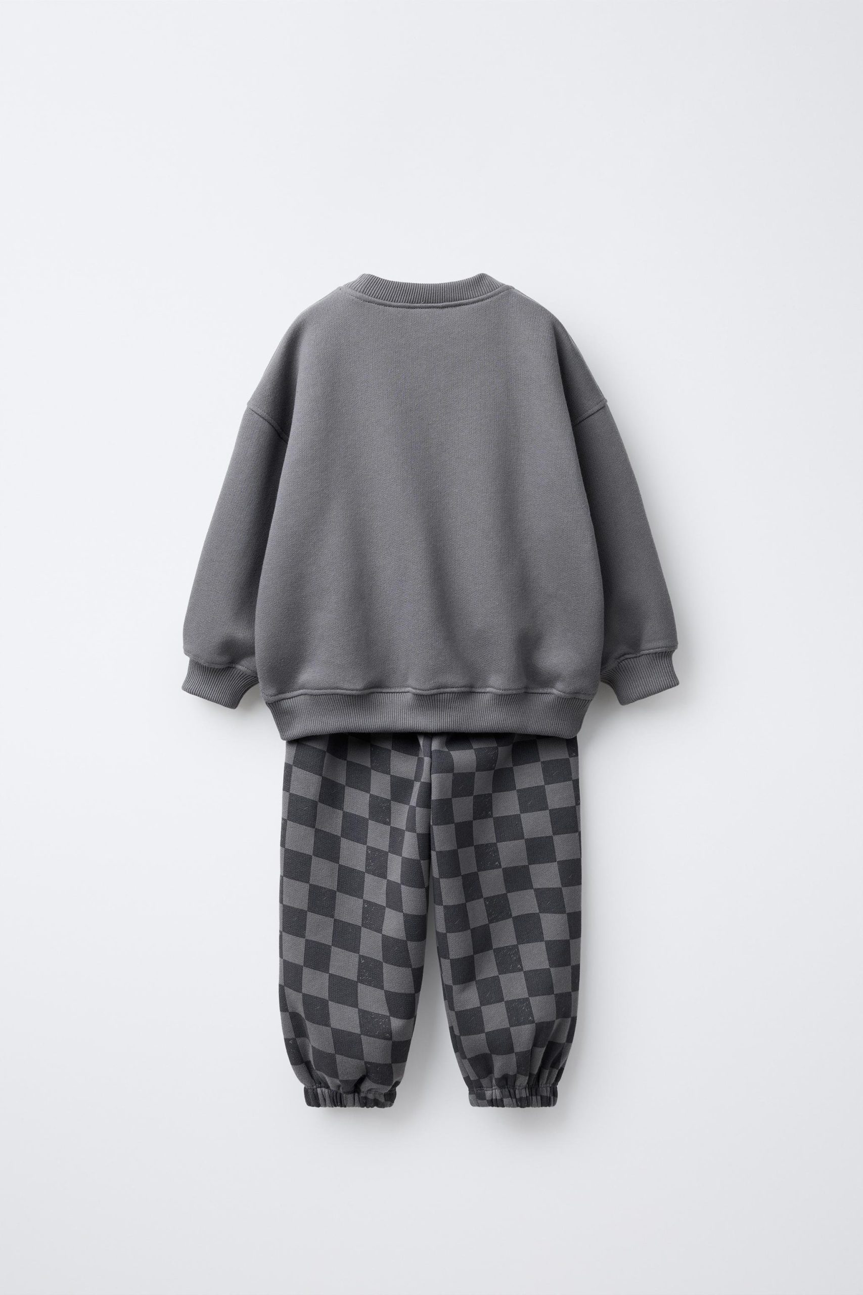 c274fd39-120f-4aaa-b181-17140fabb2e0-b-4659.jpg Boys' Cotton Charcoal Checkered Tracksuit - New Heights Detail