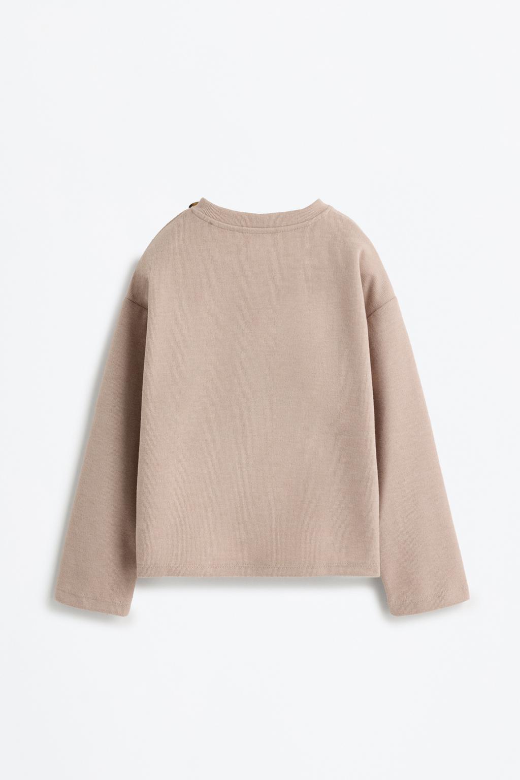 05114108711-A6.jpg Button Detail Cut Sweatshirt