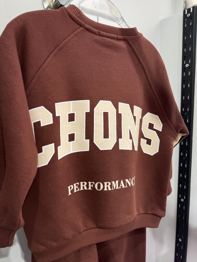 c9234110-a62c-4127-bbb5-17a131737cb7-5d-898.jpeg Unisex Kids Cotton Brown Printed Tracksuit – Sporty and Comfortable Style