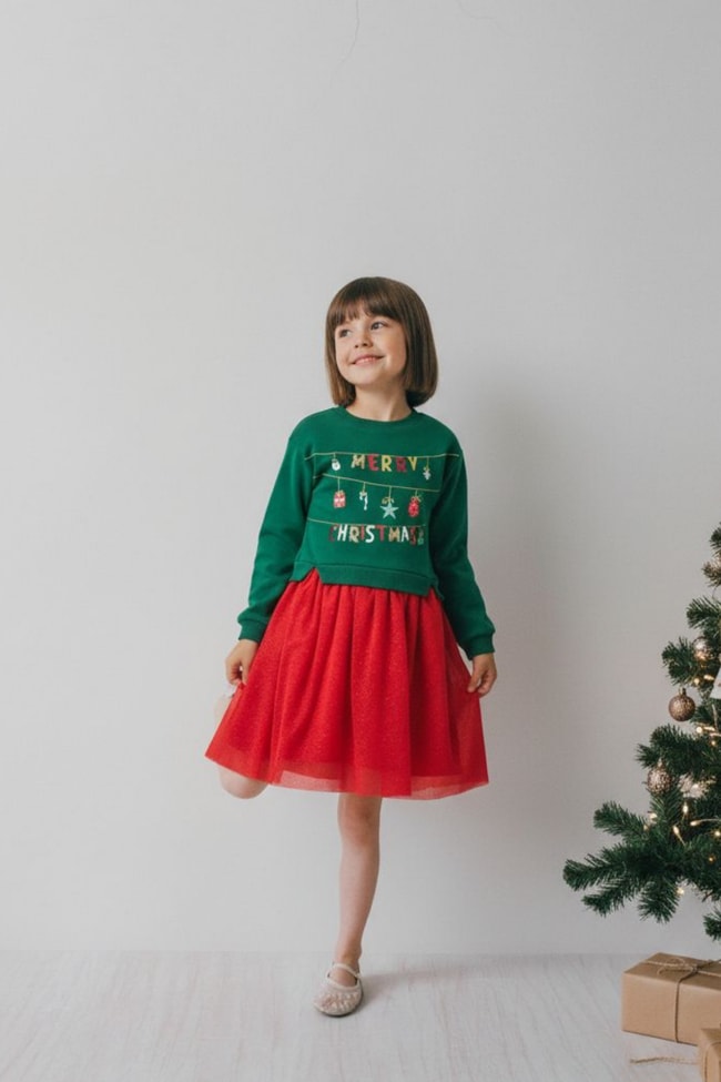 ec34de1f-d0e0-4d68-ac9f-fbf1fd6e2853-26f59d.jpg Girls' Cotton Green Dress with Red Tulle - Merry Christmas Print